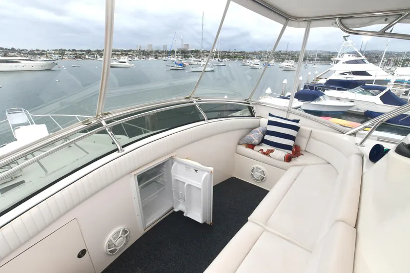 Slide: The Image of 1988 Bertram 54 Convertible yacht interior with marina view. - 19