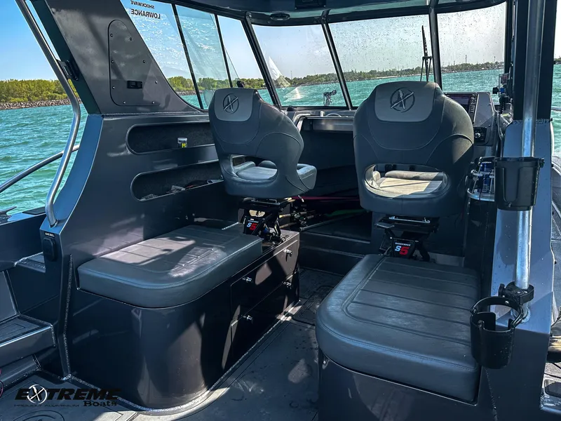 Slide: The Image of Looking Port on the Extreme Boats 795 Walk Around Curved Seating - 15