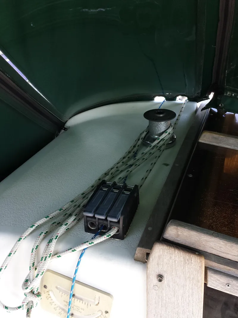 Slide: The Image of Deck of 1983 Watkins 32 sailboat with winch and rope cleats. - 7