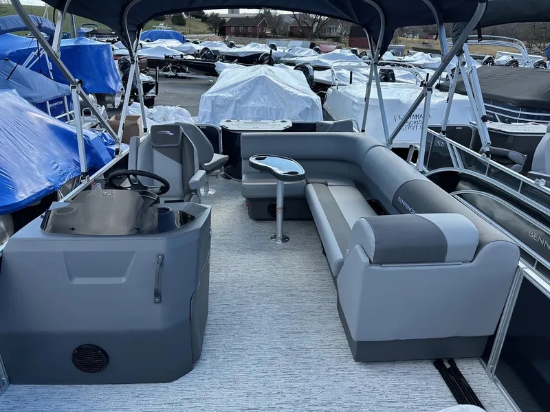 Slide: The Image of 2025 Bennington 22 SF Family Pontoon with seating and helm, in stock at marina. - 14