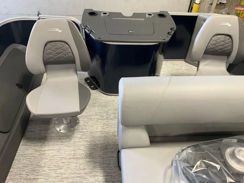 Slide: The Image of 2025 Bennington 22 SF Family Pontoon with four fishing seats, featuring modern interior design. - 21