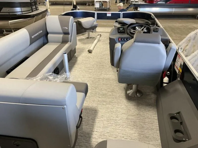 Slide: The Image of 2025 Bennington 22 SF Family Pontoon with spacious seating and modern interior design. - 28