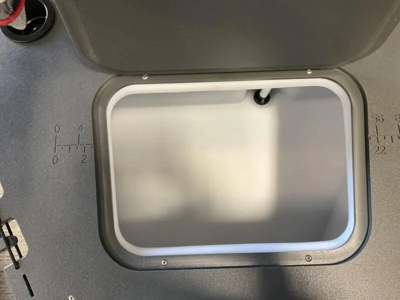 Slide: The Image of 2025 Bennington 22 SF Pontoon livewell with measurement markings. - 3