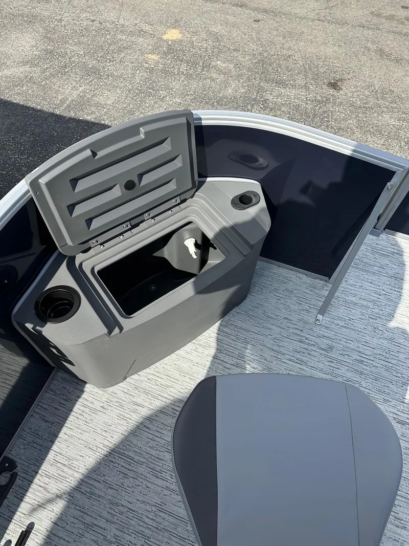 Slide: The Image of 2025 Bennington 22 SF pontoon boat interior with storage compartment and seating. - 37