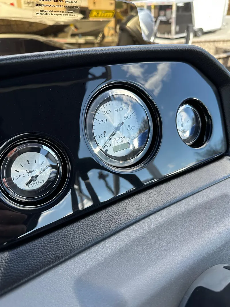 Slide: The Image of Dashboard of 2025 Bennington 22 SF Family Pontoon with gauges and controls. - 39