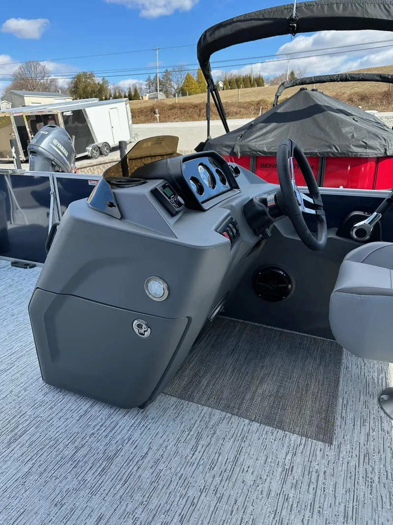 Slide: The Image of 2025 Bennington 22 SF Family Pontoon boat dashboard and steering area. - 43