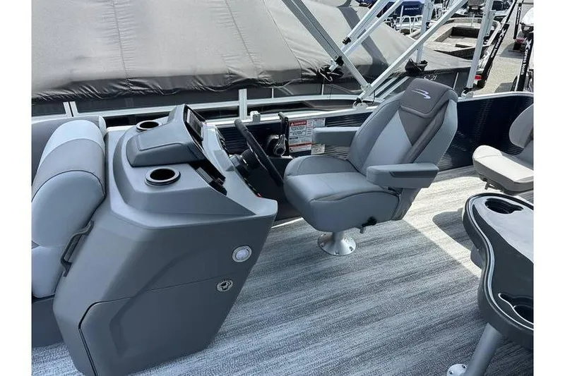 Slide: The Image of Interior of 2026 Bennington 20 SS Family/Fishing boat, featuring helm and seating area. - 13