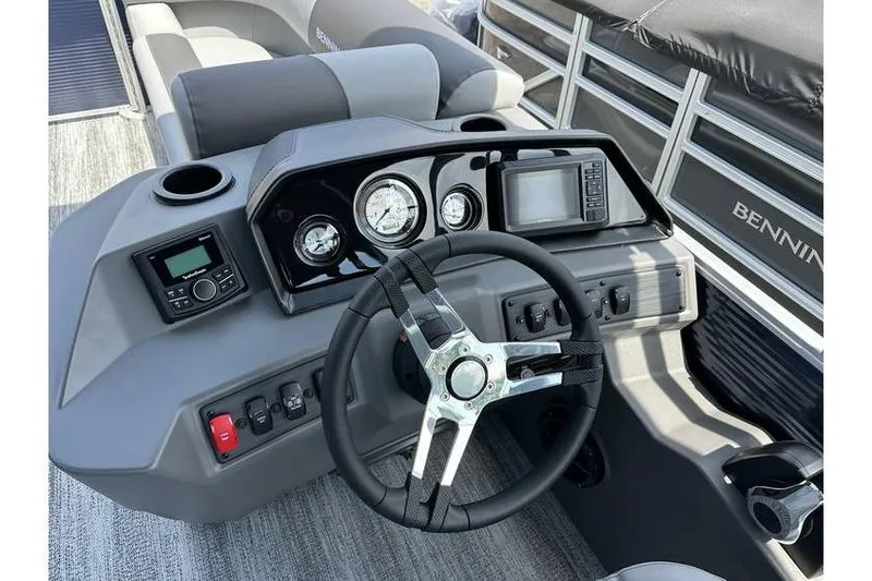 Slide: The Image of Steering console of 2026 Bennington 20 SS Family/Fishing boat with gauges and controls. - 14