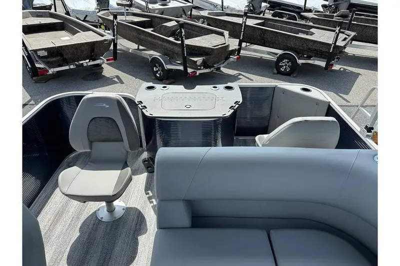 Slide: The Image of 2026 Bennington 20 SS Family/Fishing boat interior with seating and console. - 16