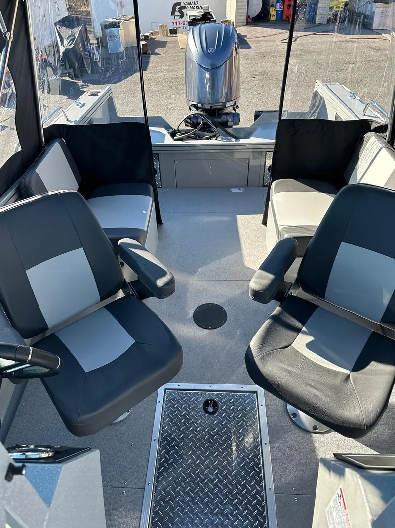 Slide: The Image of 2026 Smoker Craft Phantom 18 X2 boat interior with Yamaha 150 hp engine. - 12