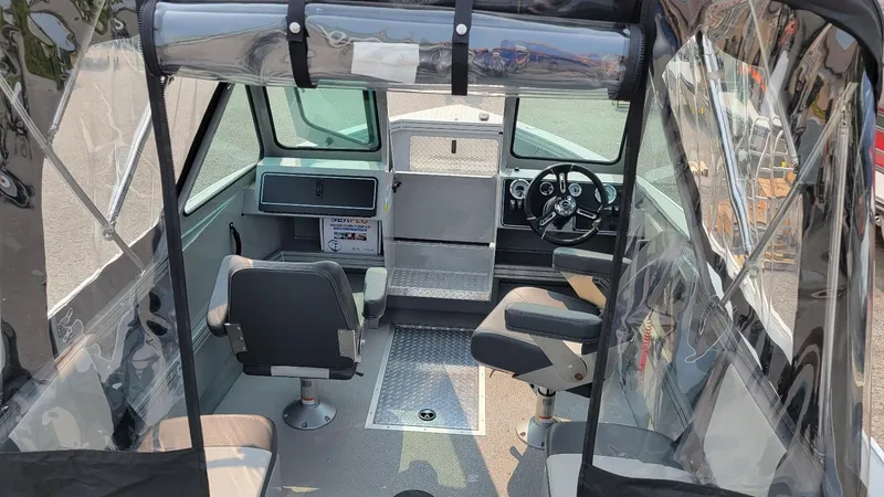 Slide: The Image of Interior of 2026 Smoker Craft Phantom 18 X2 boat with Yamaha 150 hp engine. - 20