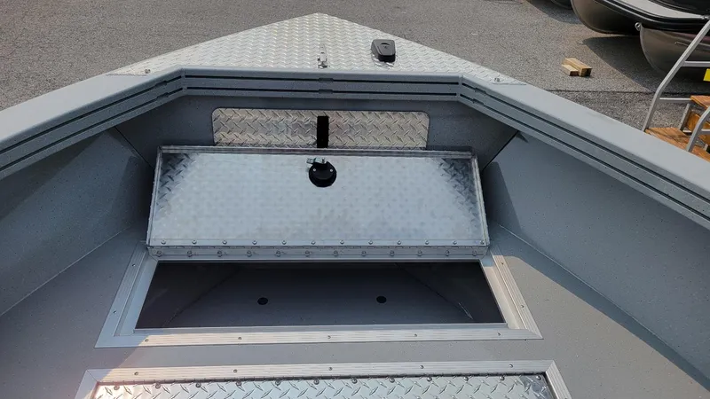 Slide: The Image of 2026 Smoker Craft Phantom 18 X2 boat interior with storage compartment, all welded design. - 30