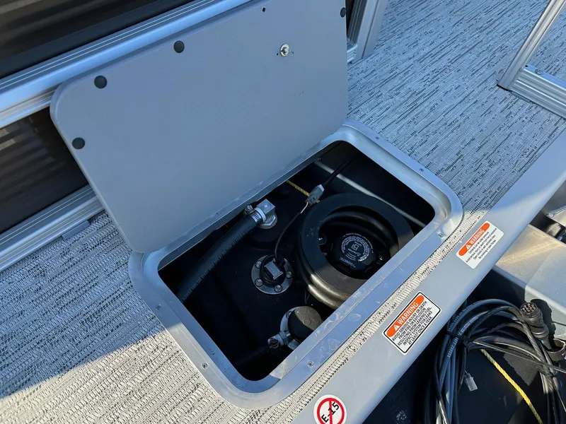 Slide: The Image of Open storage compartment on 2025 Bennington 188 SS Family Fish Pontoon boat. - 14