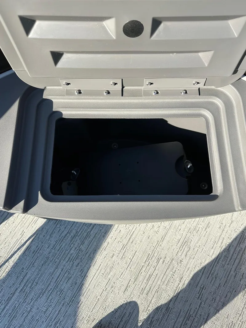 Slide: The Image of Open storage compartment on 2025 Bennington 188 SS Family Fish Pontoon boat. - 17