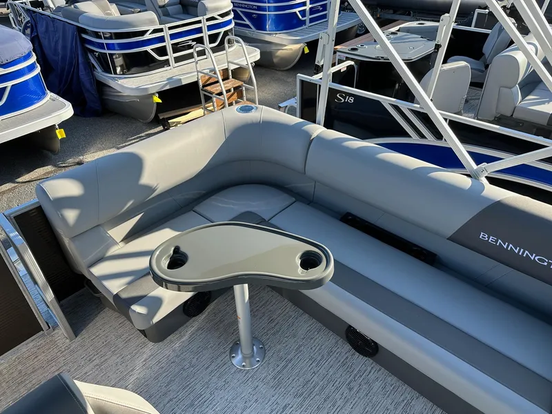 Slide: The Image of 2025 Bennington 188 SS Family Fish Pontoon interior with seating and table. - 19
