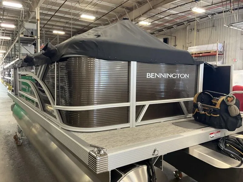 Slide: The Image of 2025 Bennington 188 SS Family Fish Pontoon in warehouse, covered and ready for sale. - 31