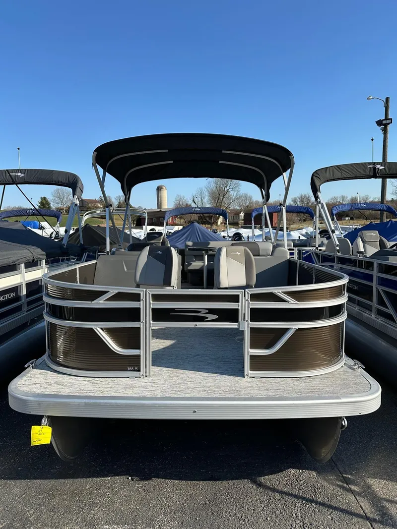 Slide: The Image of 2025 Bennington 188 SS Family Fish Pontoon, in stock, displayed outdoors. - 35