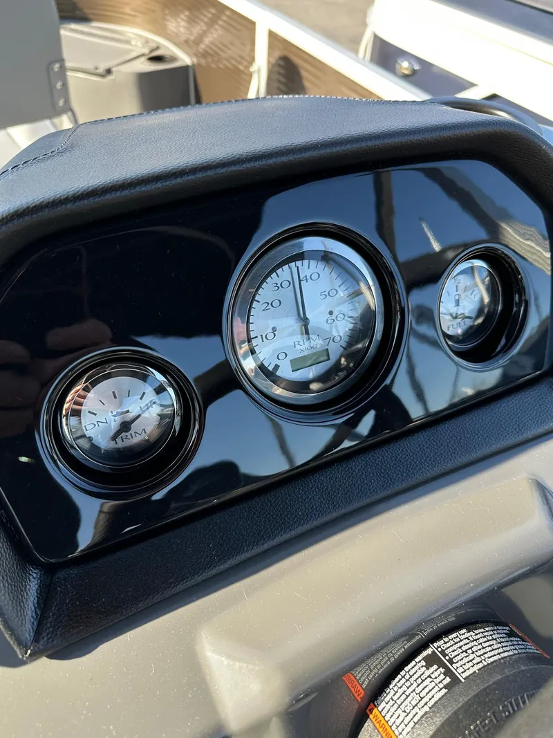 Slide: The Image of Dashboard gauges of 2025 Bennington 188 SS Family Fish Pontoon boat. - 42