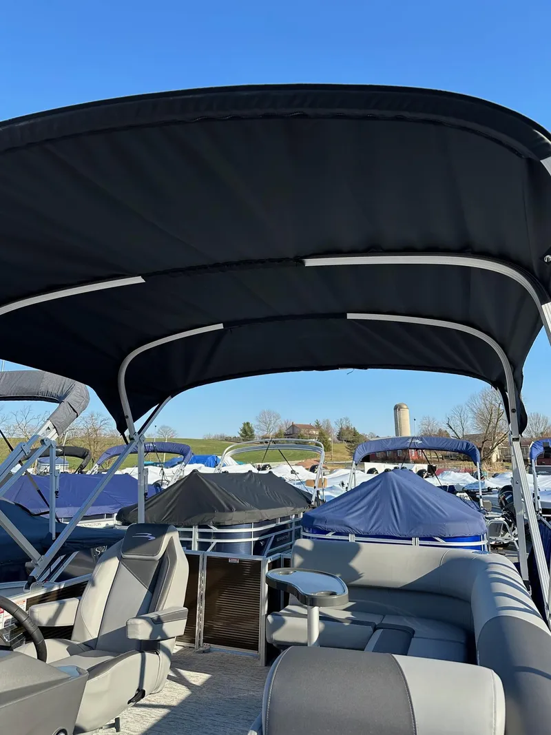 Slide: The Image of 2025 Bennington 188 SS Family Fish Pontoon with canopy, in stock, outdoor display. - 44