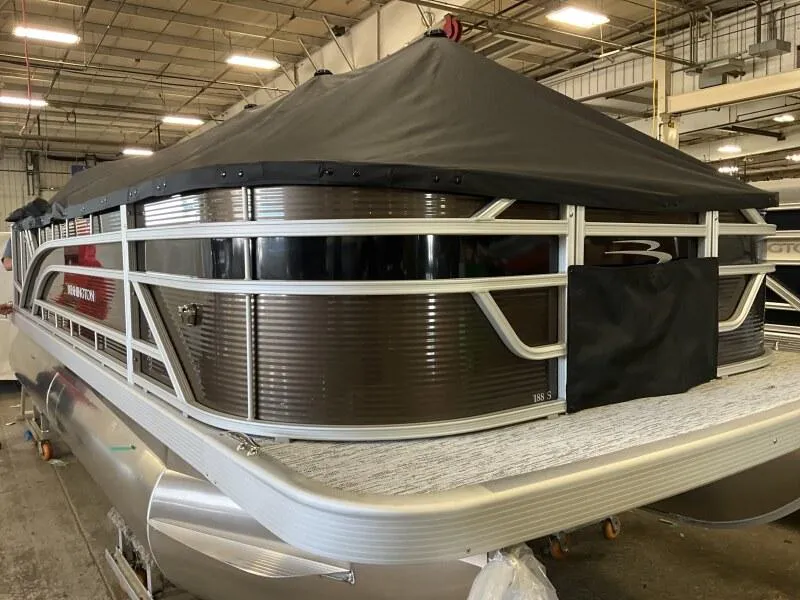 Slide: The Image of 2025 Bennington 188 SS Family Fish Pontoon in stock, covered and displayed indoors. - 7