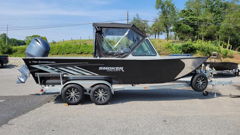 Slide: The Image of 2026 Smoker Craft Pro Sportsman 2072 boat with Yamaha 150 engine on trailer. - 14