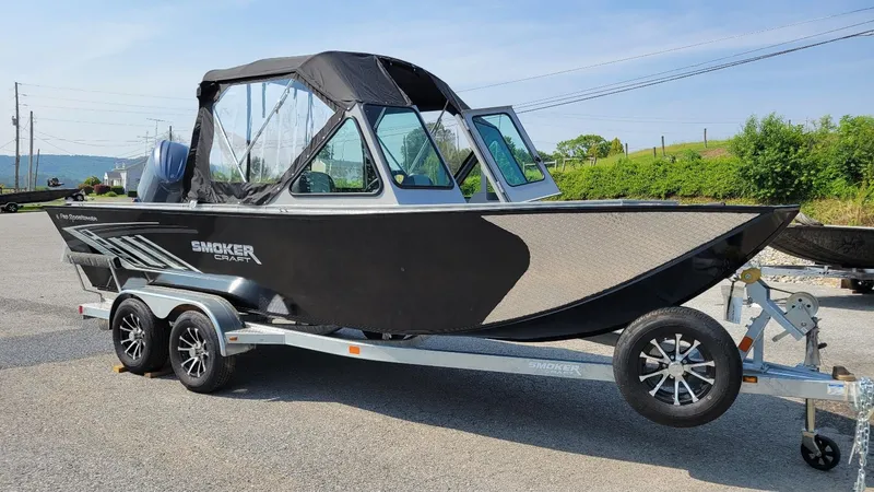 Slide: The Image of 2026 Smoker Craft Pro Sportsman 2072 dual console boat with Yamaha 150, on trailer. - 15