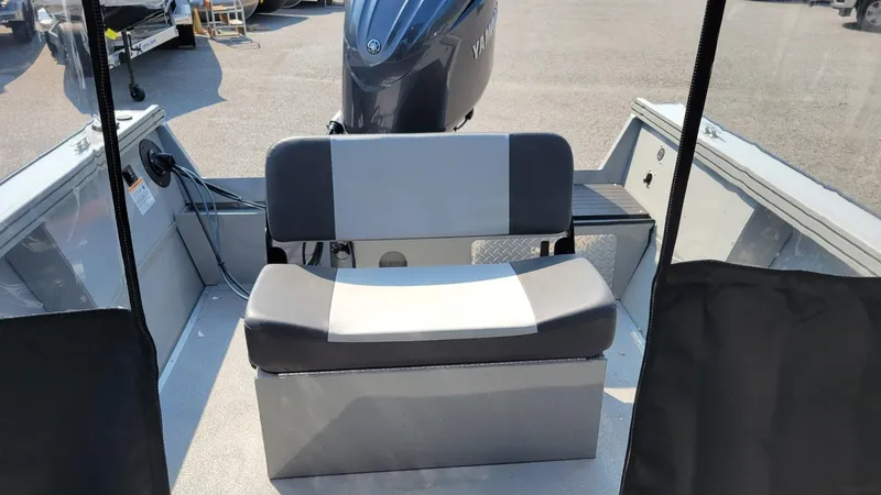 Slide: The Image of 2026 Smoker Craft Pro Sportsman 2072 boat interior with Yamaha 150 engine. - 22