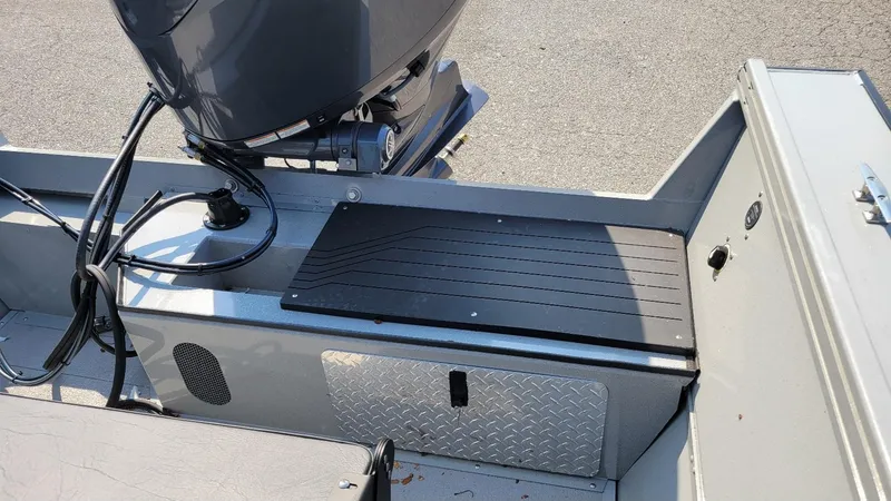 Slide: The Image of 2026 Smoker Craft Pro Sportsman 2072 boat interior with Yamaha 150 engine, dual console. - 23