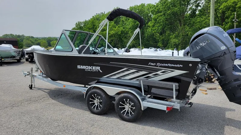 Slide: The Image of 2026 Smoker Craft Pro Sportsman 2072 boat with Yamaha 150 engine, dual console, on trailer. - 26