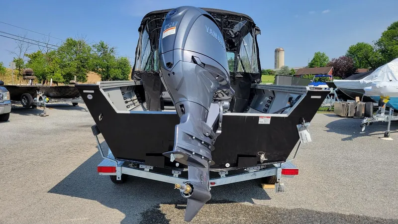 Slide: The Image of 2026 Smoker Craft Pro Sportsman 2072 with Yamaha 150 outboard motor, rear view. - 4