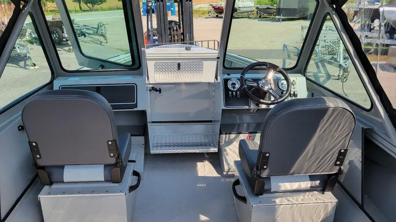 Slide: The Image of Interior of 2026 Smoker Craft Pro Sportsman 2072 dual console boat with Yamaha 150 engine. - 5