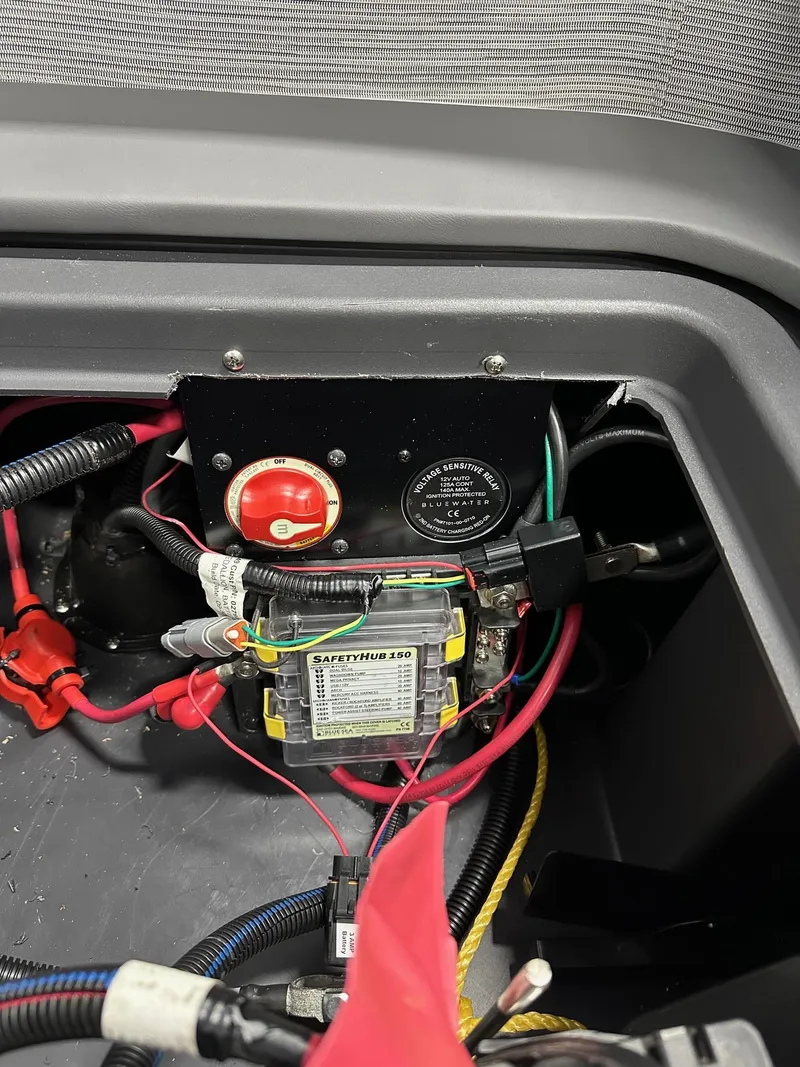 Slide: The Image of Electrical components inside a 2025 Bennington 22 MFB Tritoon boat. - 10
