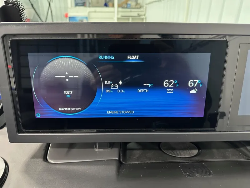 Slide: The Image of Display screen of 2025 Bennington 22 MFB Tritoon showing engine status and environmental data. - 12