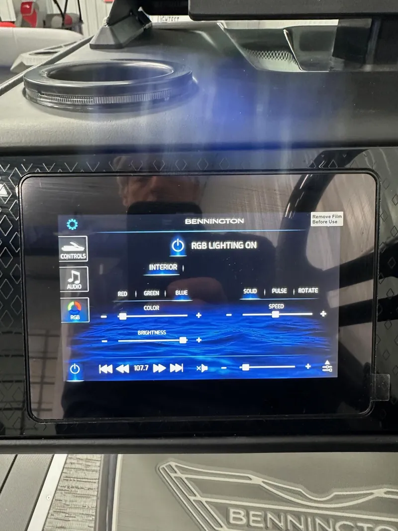 Slide: The Image of Touchscreen control panel of 2025 Bennington 22 MFB Tritoon with RGB lighting settings. - 14