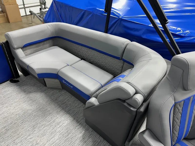 Slide: The Image of 2025 Bennington 22 MFB Tritoon interior with gray and blue seating, showcasing luxury and comfort. - 35