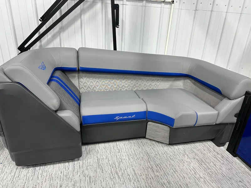 Slide: The Image of 2025 Bennington 22 MFB Tritoon interior with gray and blue seating. - 37
