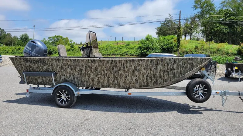 The Image of 2026 Smoker Craft Pro Sportsman 1872 CC boat with Yamaha 115 hp engine on trailer. - 1