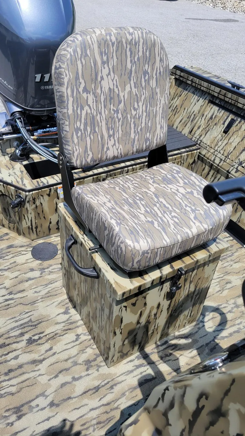 Slide: The Image of 2026 Smoker Craft Pro Sportsman 1872 CC with Yamaha 115 hp, camo seating and console. - 18