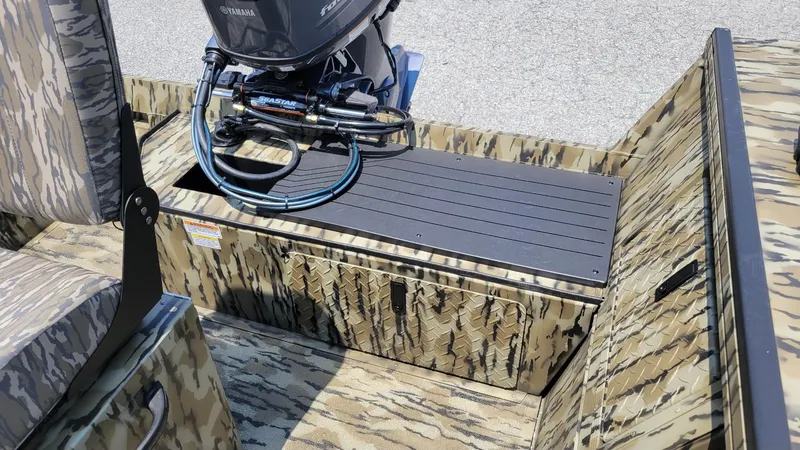 Slide: The Image of 2026 Smoker Craft Pro Sportsman 1872 CC with Yamaha 115 hp engine, camo design. - 21