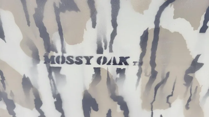 Slide: The Image of Camouflage pattern with "Mossy Oak" text on Smoker Craft Pro Sportsman 1872 CC boat. - 3