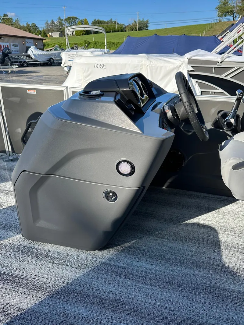 Slide: The Image of 2025 Bennington 21 SF Family boat console with steering wheel and controls. - 20