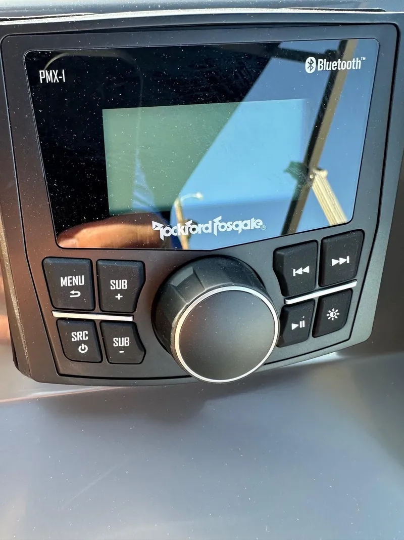 Slide: The Image of Rockford Fosgate PMX-1 Bluetooth stereo system on 2025 Bennington 21 SF Family boat. - 21