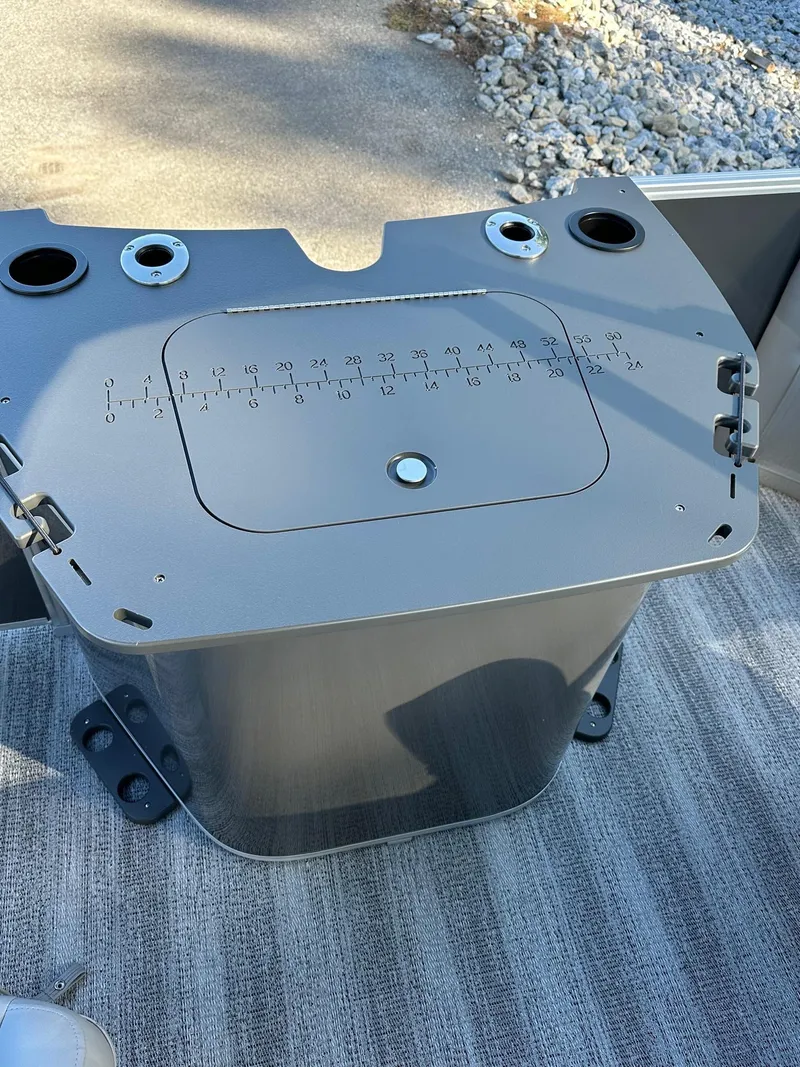 Slide: The Image of 2025 Bennington 21 SF Family boat fishing station with measurement guide and rod holders. - 8