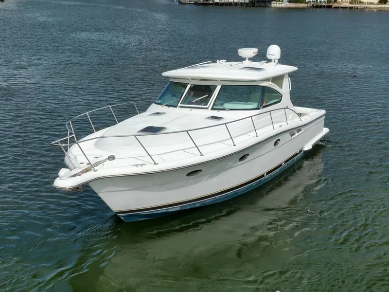 Slide: The Image of 2004 Tiara Yachts 38 Open cruising on calm waters. - 0