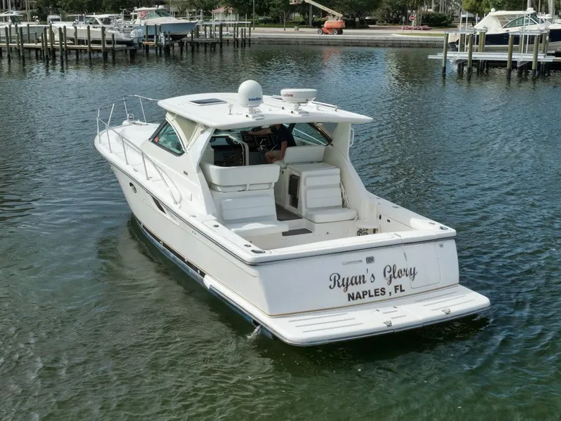 Slide: The Image of 2004 Tiara Yachts 38 Open boat on water, rear view, Naples, FL. - 1