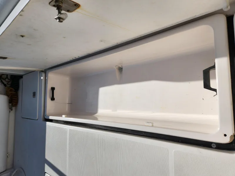 Slide: The Image of Open storage compartment on a 2004 Tiara Yachts 38 Open boat. - 13