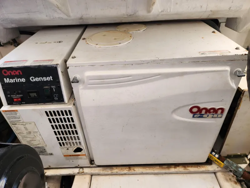 Slide: The Image of Onan Marine Genset in 2004 Tiara Yachts 38 Open engine room. - 23