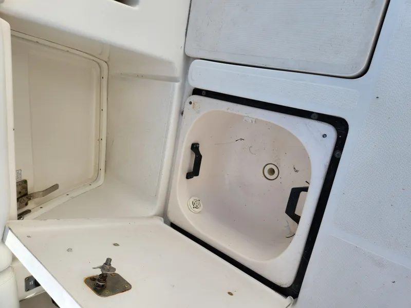Slide: The Image of Storage compartment on a 2004 Tiara Yachts 38 Open boat. - 26