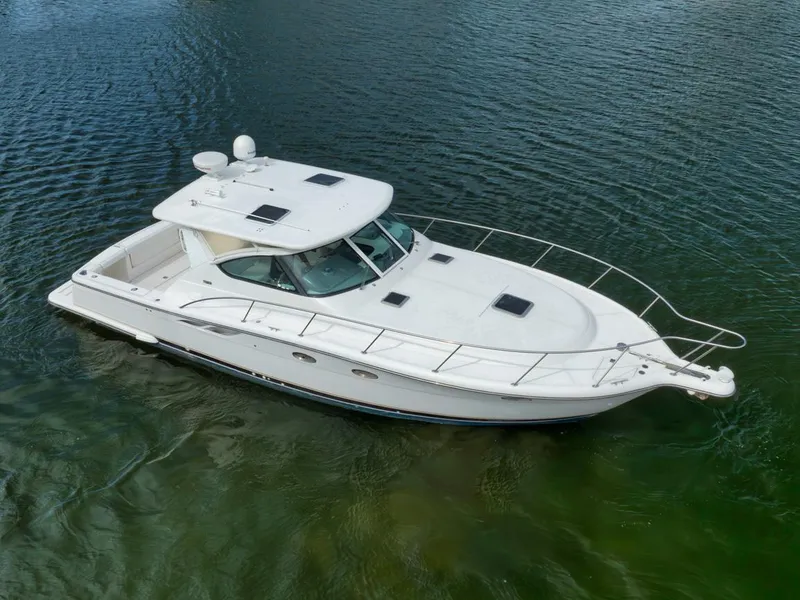 Slide: The Image of 2004 Tiara Yachts 38 Open boat on calm water, aerial view. - 40