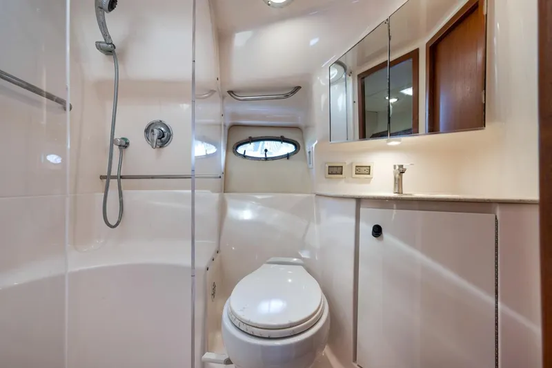 Slide: The Image of Bathroom interior of 2004 Tiara Yachts 38 Open, featuring shower and toilet. - 43